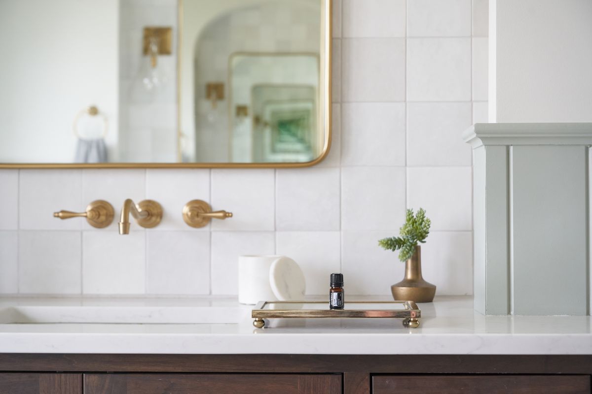 white bathroom brass mirror