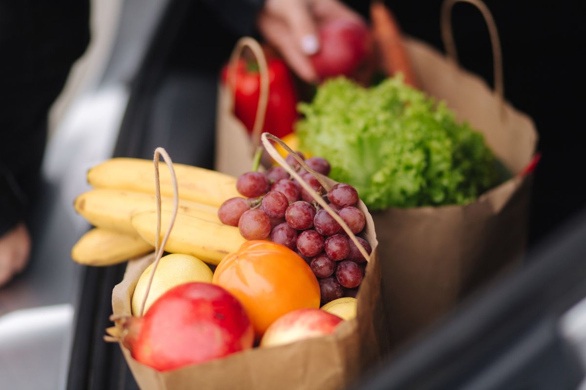 fresh fruit in grocery bags