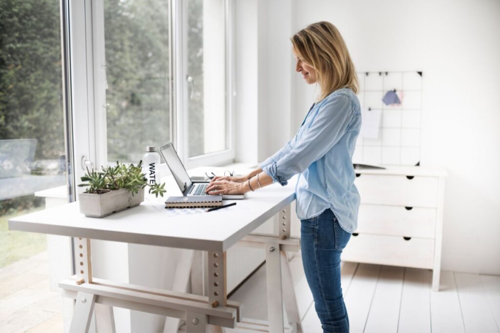 woman working at home white office