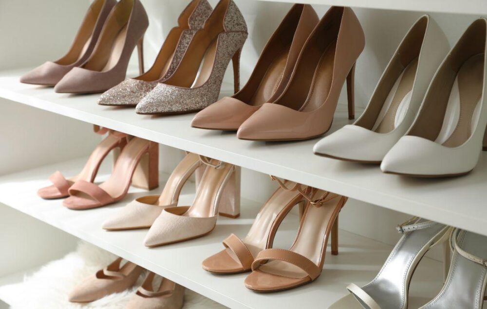 organized wall of shoes on shelves