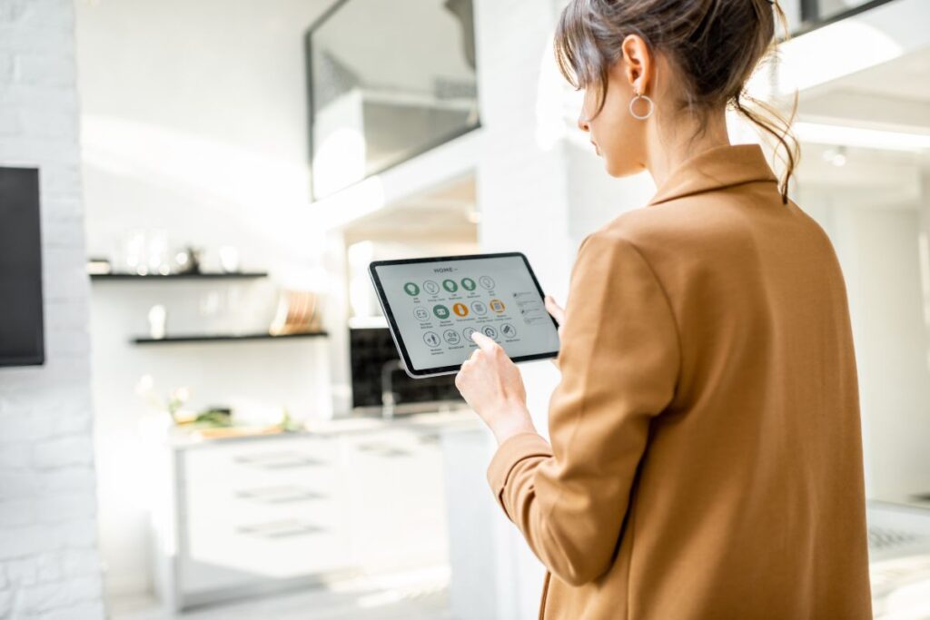 young woman using tablet smart home