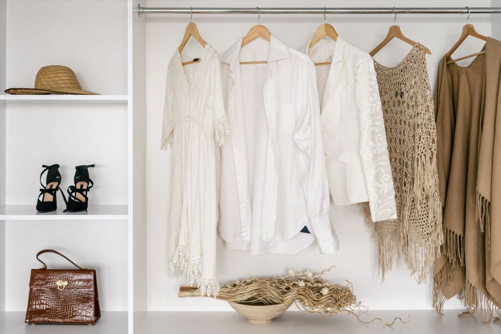 organized minimal white closet