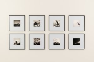 Black Framed Black and White Photos in a Gallery 