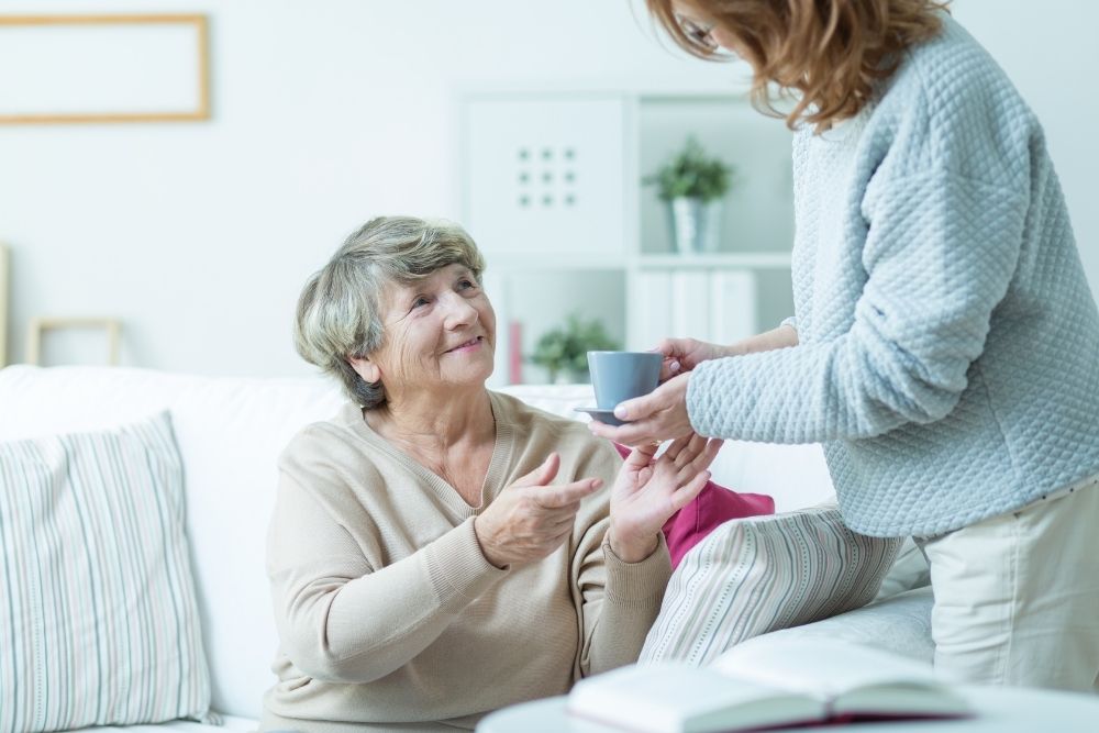 woman caring for her aging mother